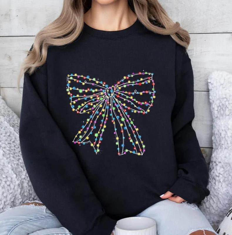 Christmas Light Coquette Bow Shirt, Christmas Season T-Shirt, New year Gift, Christmas Sweatshirt, Retro Christmas Shirt,...