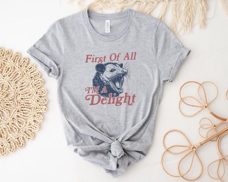 First of All I'm a Delight T-Shirt, Funny Women's Shirt, Cute Raccoon Shirt, Sarcastic T-Shirt, Funny Saying T-Shirt,...