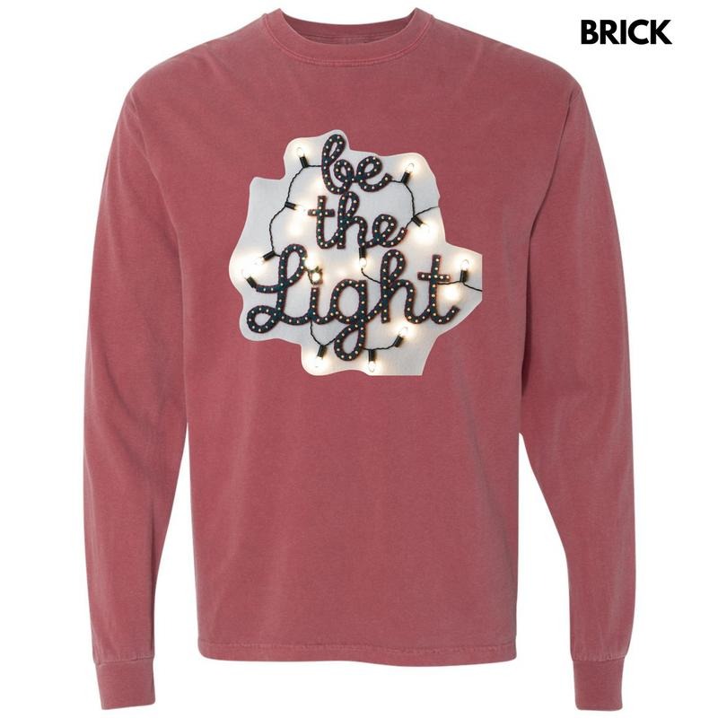Light Bulb Be The Light Long Sleeve Comfort Colors T-Shirt 'NLB Hoodie, Sweatshirt | ZylaModa.com