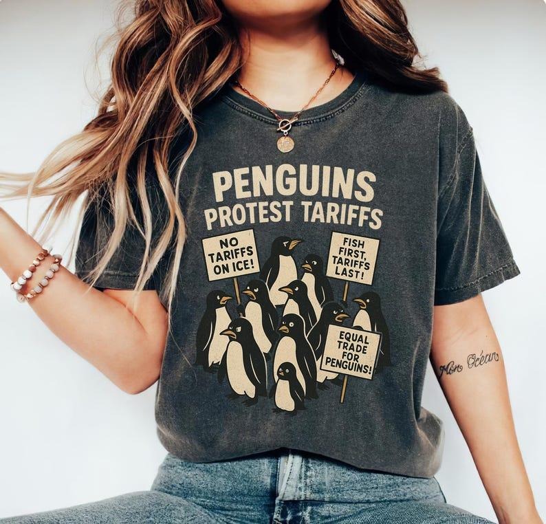Penguins Protest Tariffs Shirt, Funny Tariffs Shirt, Funny Penguin Graphic Tee Hoodie, Sweatshirt | ZylaModa.com