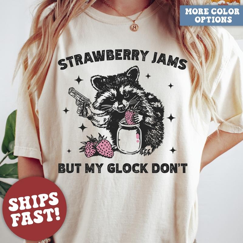 Raccoon Shirt Strawberry Jams But My Glock Dont Funny Raccoon Shirt Funny Meme T-Shirt Top Womenswear Cotton Tshirt...