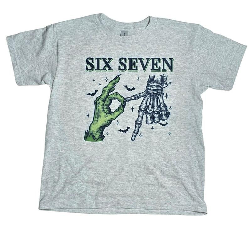 Six Seven Halloween Spooky Graphic Tee with Green Hand and Skeleton Design for Festive Wear Hoodie, Sweatshirt | ZylaModa.com