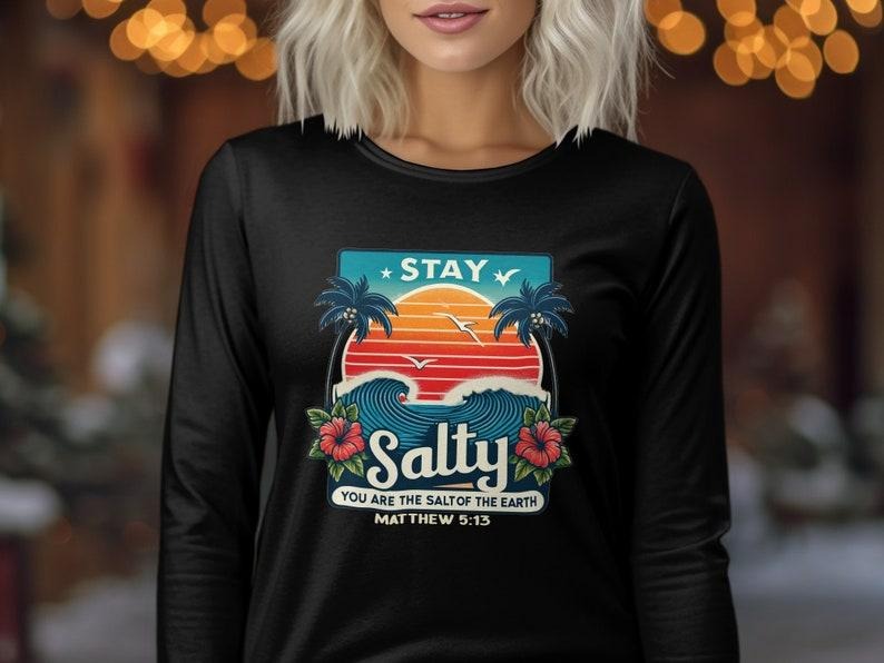 Stay Salty Christian Quote T-Shirt, Matthew 5:13 Bible Verse, Tropical Sunset and Waves Design, Long Sleeve, Hoodie style...