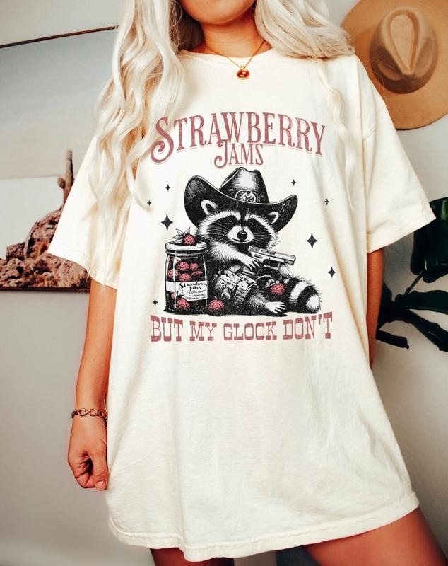 Strawberry Jams But My Glock Don't Funny Raccoon Shirt, Raccoon Meme Tee Hoodie, Sweatshirt | ZylaModa.com