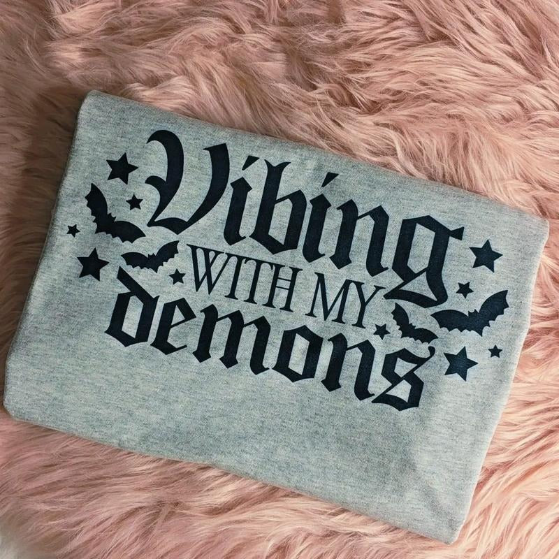 Vibing with my demons Graphic Tee Loose fit Hoodie, Sweatshirt | ZylaModa.com