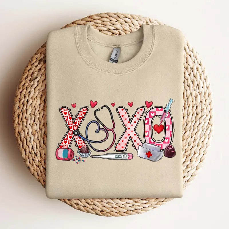 XOXO Nurse Sweatshirt - Valentines Day Shirt for Nurses - Unisex Cotton T-shirt - Fabric Hoodie | ZylaModa.com