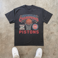 1990 'PISTONS' CHAMPIONSHIP HEAVY BLACK T-SHIRT Hoodie, Sweatshirt | ZylaModa.com (Image 1)